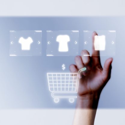 Person adding clothes to cart closeup for online shopping campaign